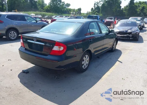 2003 Toyota Camry Le z USA, uszkodzony, nr VIN JTDBE32K730235638